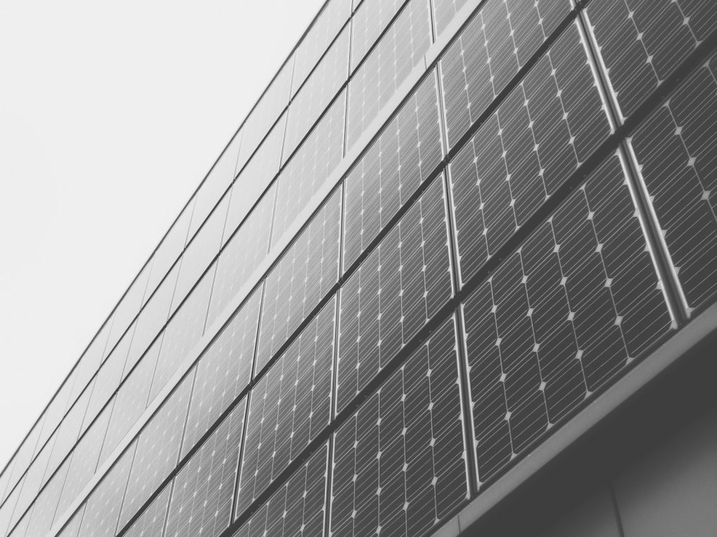 close-up photography of black and gray concrete building